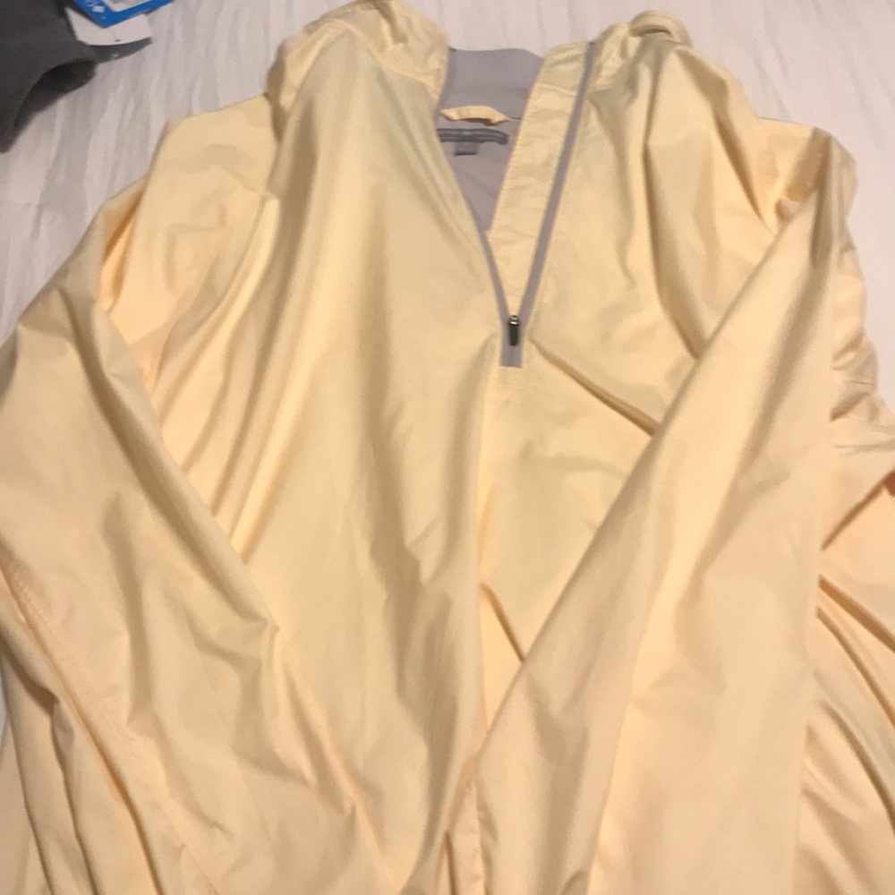Peter Miller yellow light rain coat
